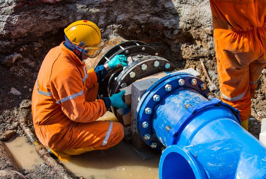 guy-working-on-pipe